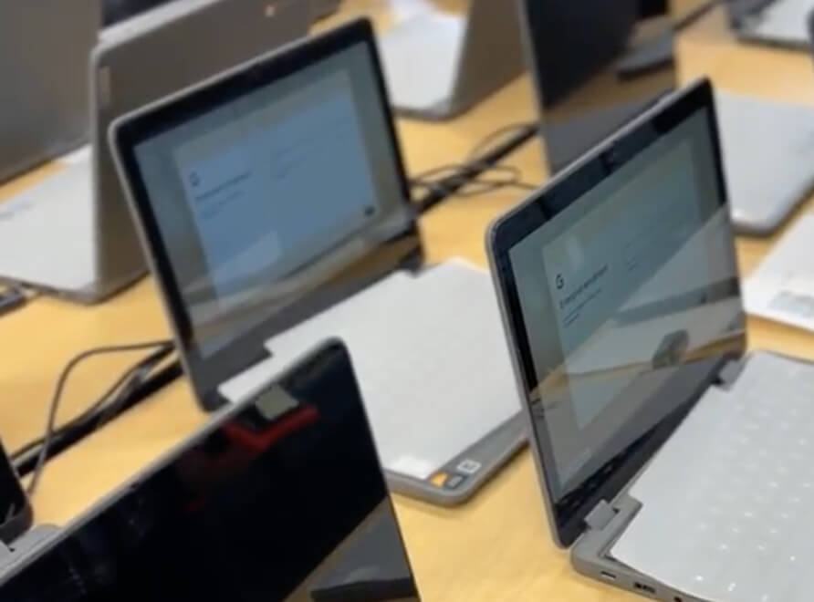 student laptops on desk